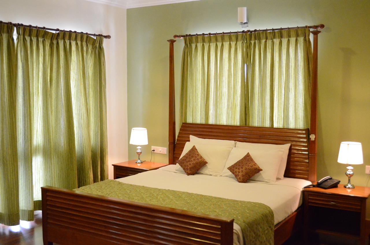 Trinity Suits Bangalore Extérieur photo